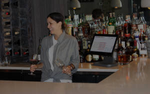 Bartender Serving Wine